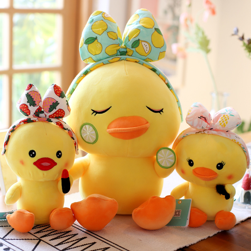 Gấu bông vịt vàng đeo nơ đáng yêu - vịt con xấu xí cực cute