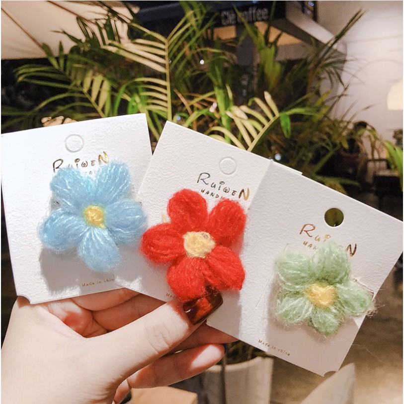 Kẹp tóc hoa cúc bằng len mimo baby