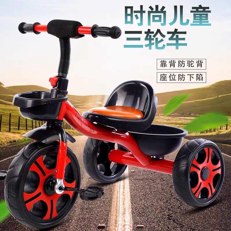 Xe 3 bánh ghế da và có hộp đựng đồ đằng sau cho bé