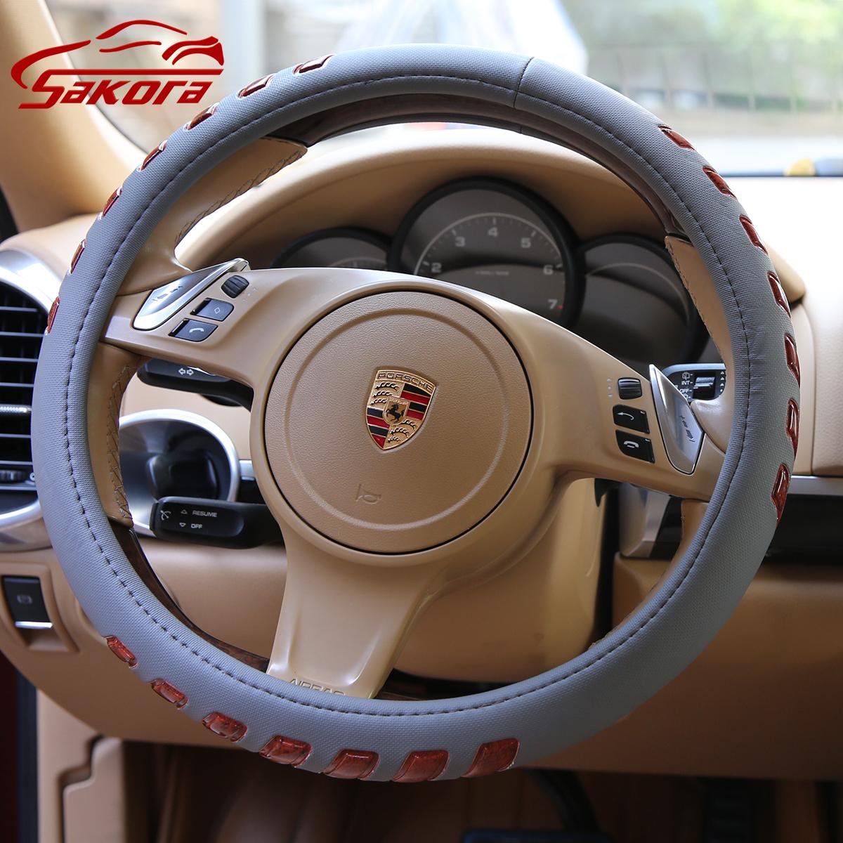 [HCM]Bọc vô lăng ô tô Bọc vô lăng da xe hơi vân nổi chất liệu da pu lớp Simili + vòng cao su （Xám）38CM