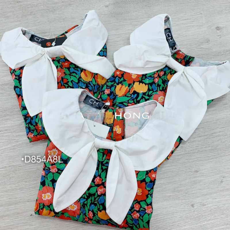 Đầm suông hoa đuôi cá , cổ trăng nơ cực xinh from rộng dươi 70 kg