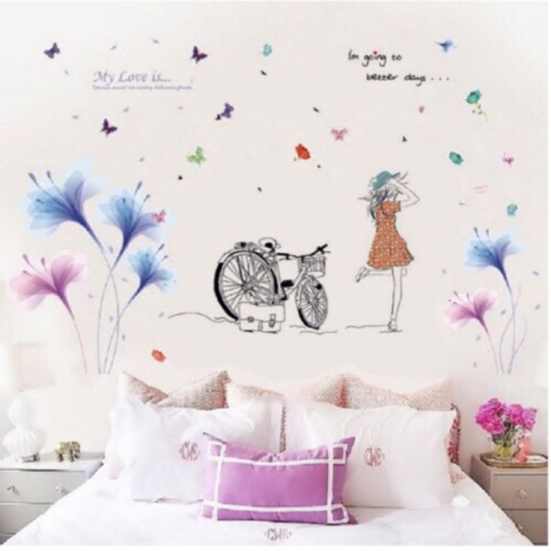 Decal dán tường cô gái xe đạp và hoa pha lê tím