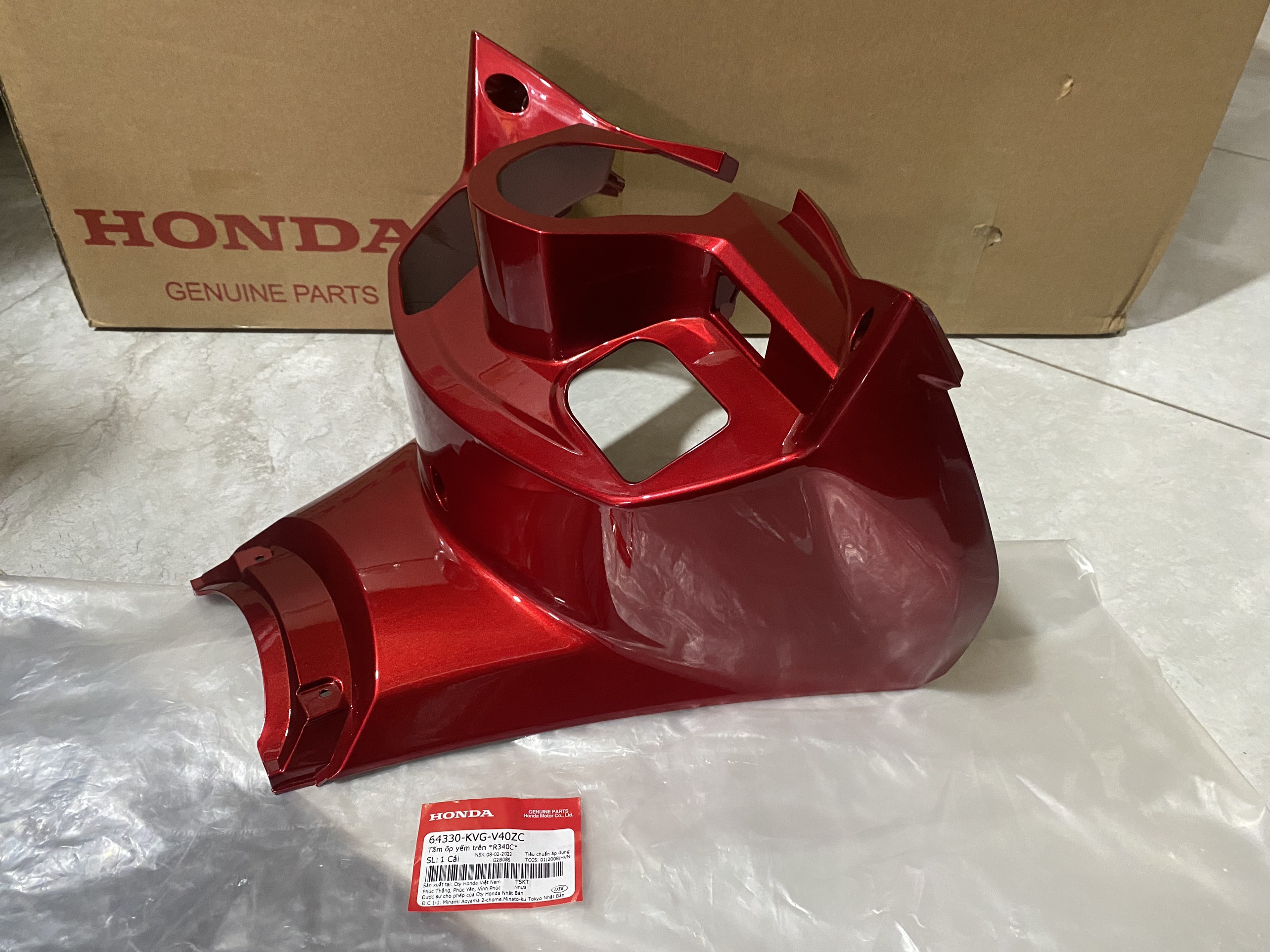 Tấm ốp yếm trên air blade béo 2011