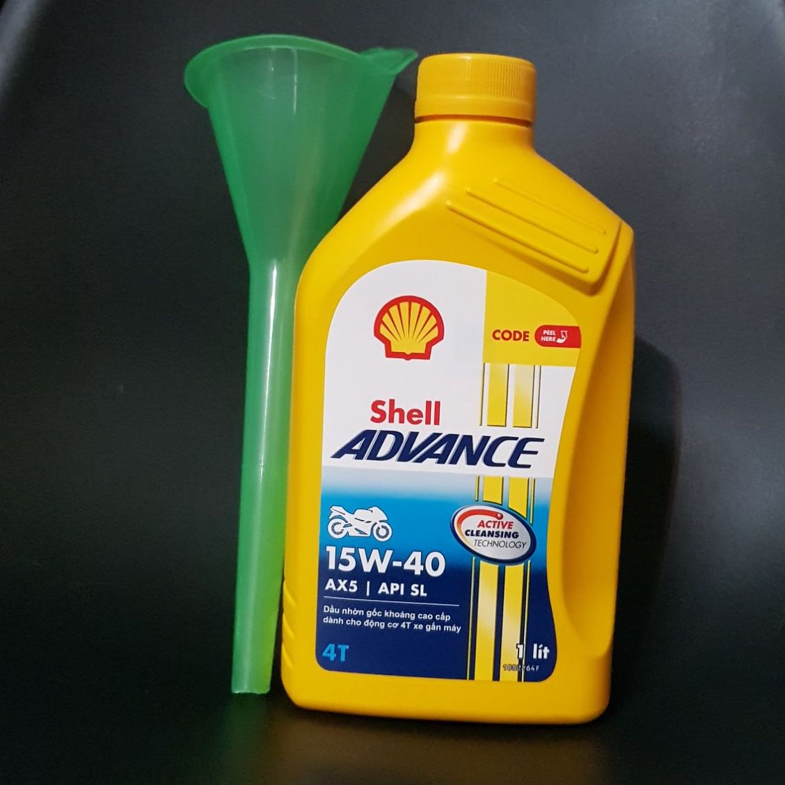 -tặng phễu- nhớt xe máy shell ax5 shell vàng chai 1l. dầu động cơ xe máy 4t shell ax5 15w40 1l tặng phễu rót nhớt