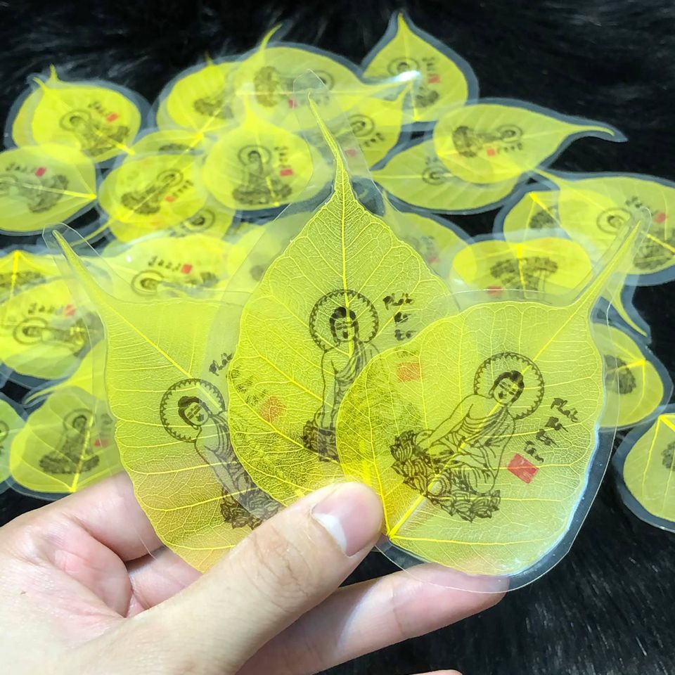Lá Bồ Đề Vàng In Hình Phật Ép Plastic - Cầu Tài Bình An Mang Lại May Mắn Cho Mình Và Người Người Thân