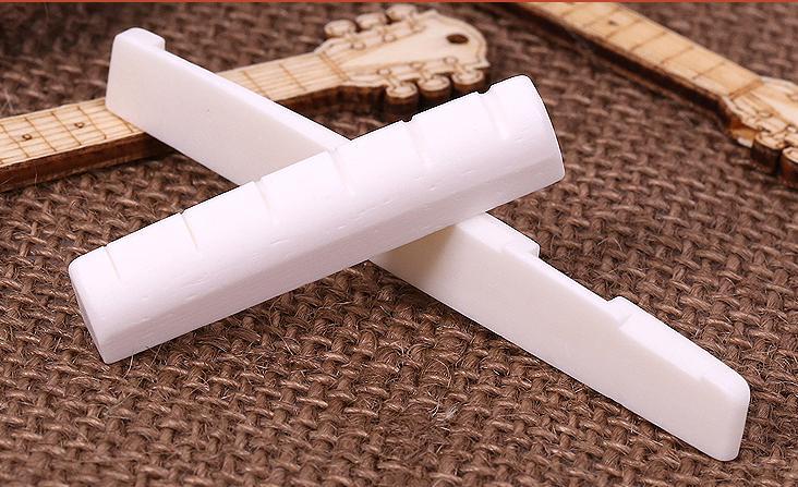 [HCM]Bộ ngựa lược đàn làm bằng xương dành cho Guitar Acoustic( Ngựa 7.4cm lược 4.3cm)