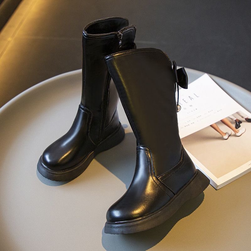 Boot đùi nơ lót lông cho bé gái siêu điệu.