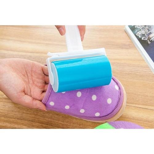 Cây lăn keo dính bụi quần áo