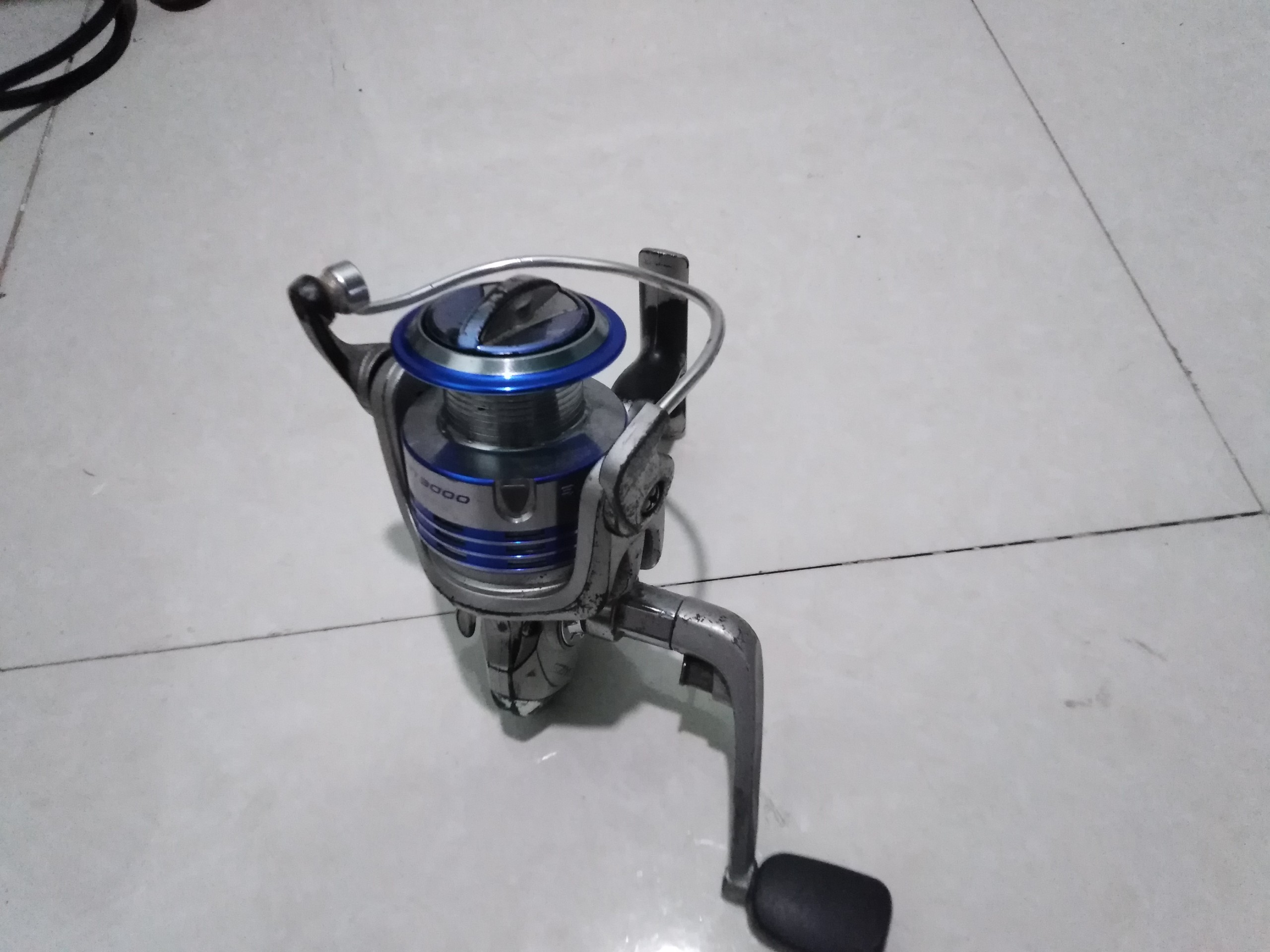 Máy câu bãi nhật Bluster spin 3000 cối kim loại