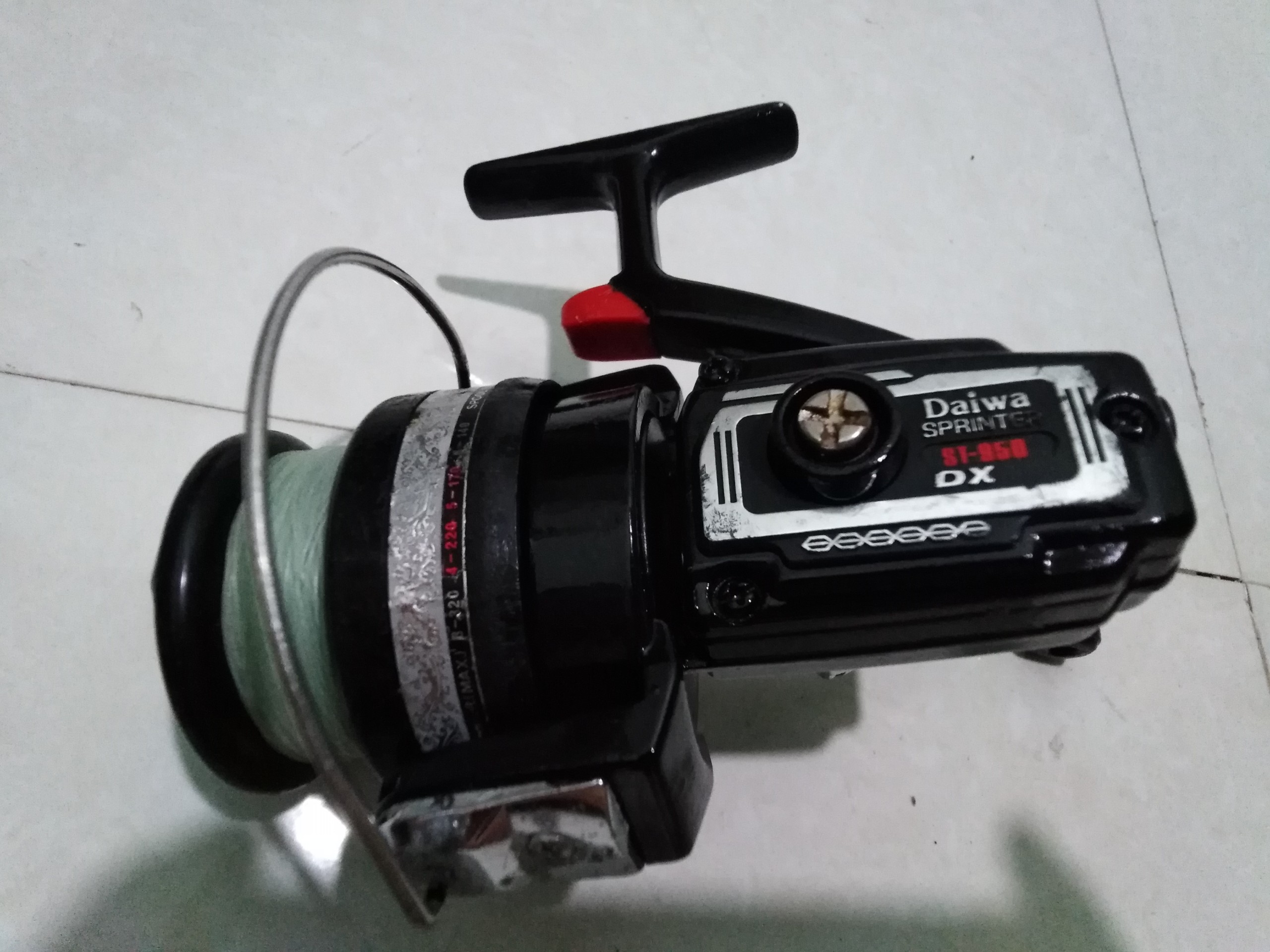 Máy câu nhật bãi daiwa st950dx 5000
