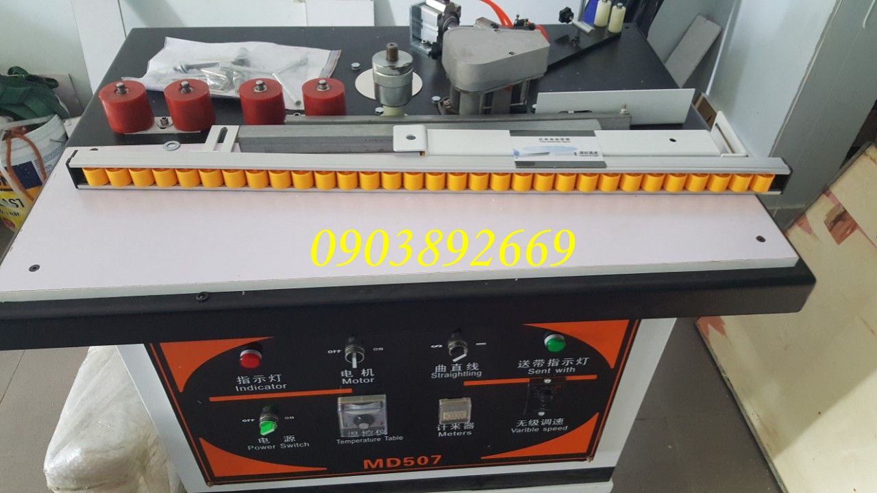 Máy dán cạnh viền tranh ảnh