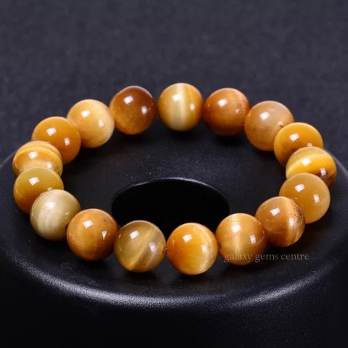 Vòng tay chuỗi hạt đá mắt hổ màu vàng -dũng143