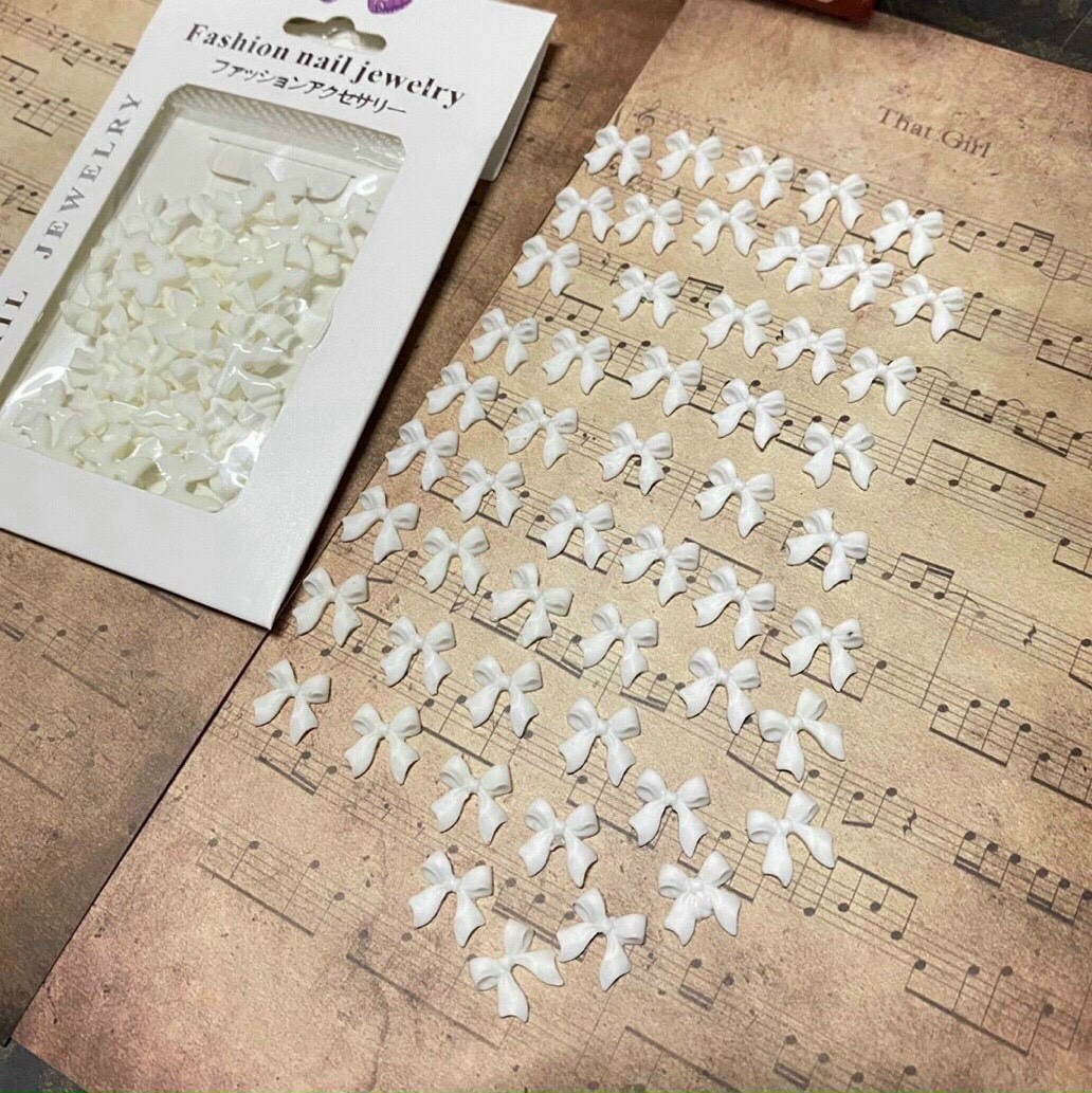 Set charm nơ trắng đính móng tay - sugar nails