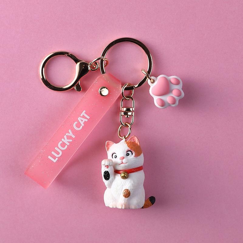 Móc khóa mèo vẫy tay