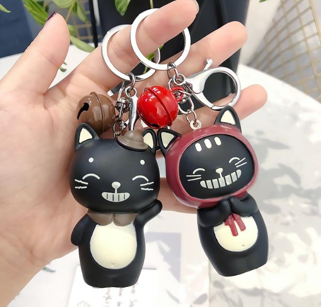 Móc khóa mèo đen Silicon bóp kêu tít tít kèm chuông nhỏ