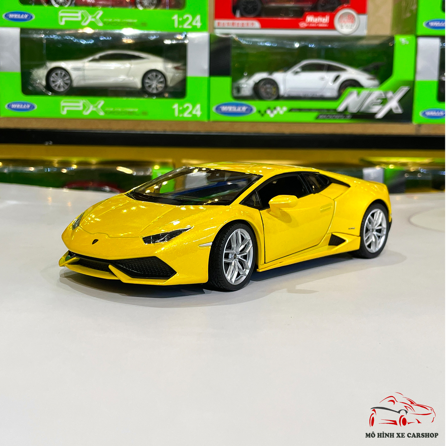 Xe mô hình sắt chất lượng Lamborgini Huracan LP610 hãng Welly tỉ lệ 1:24 màu vàng