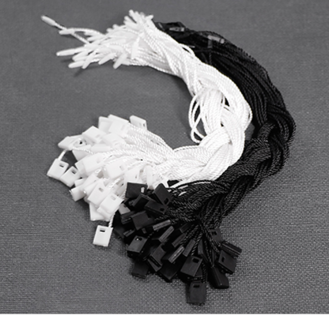 Dây tag treo nhãn mác quần áo  - khoảng 1000 sợi/ bịch