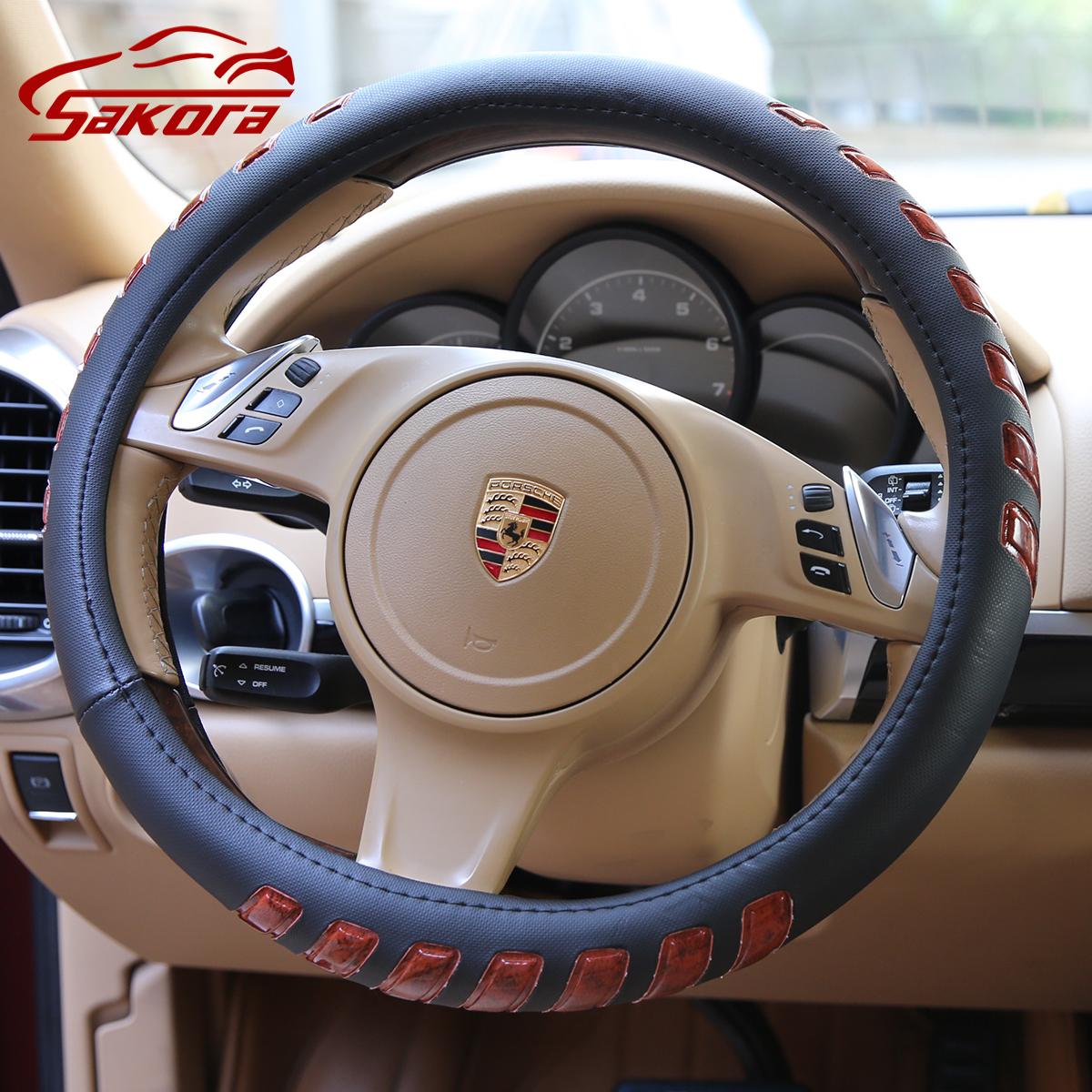 [HCM]Bọc vô lăng ô tô Bọc vô lăng da xe hơi vân nổi chất liệu da pu lớp Simili + vòng cao su （Đen）38CM