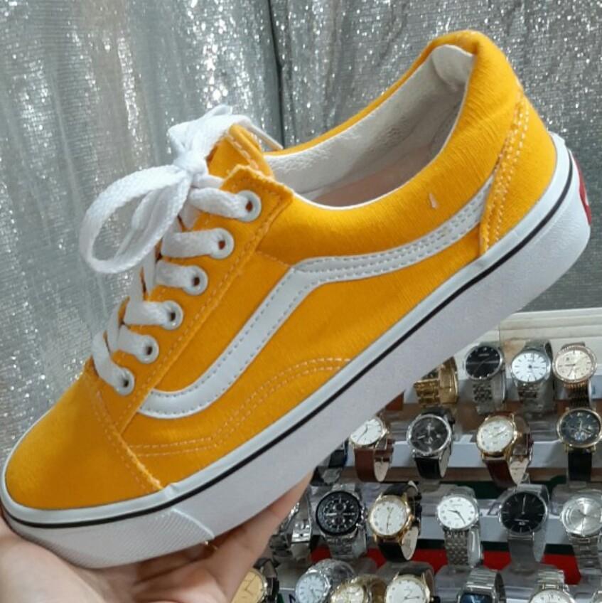 Giày thể thao Nữ vàng viền trắng