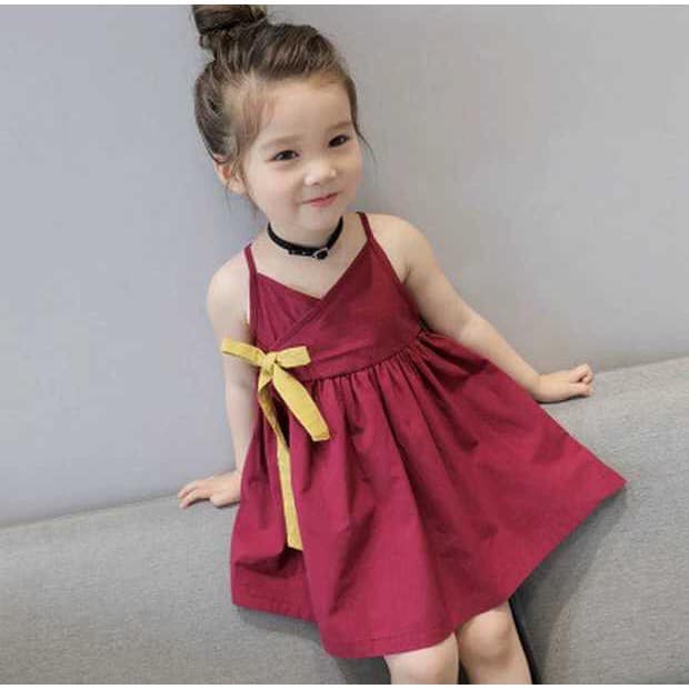 Váy 2 dây đỏ nơ vàng cho bé 2-7 tuổi