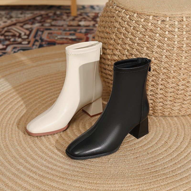 Bốt nữ 7 phân có lót lông hàng full hộp size 35 - 39 với 2 màu đen và kem