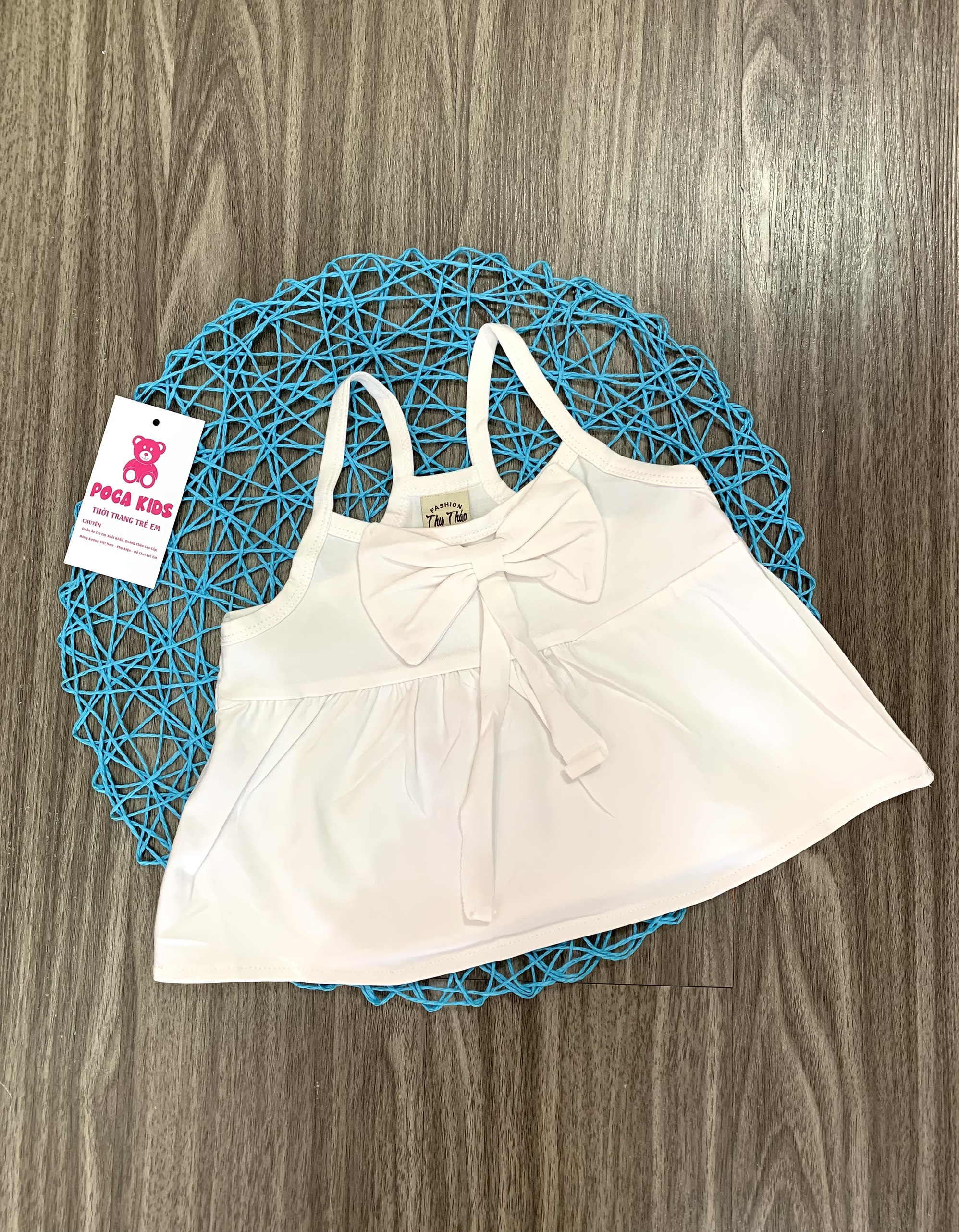 Áo 2 dây trắng nơ Bé gái