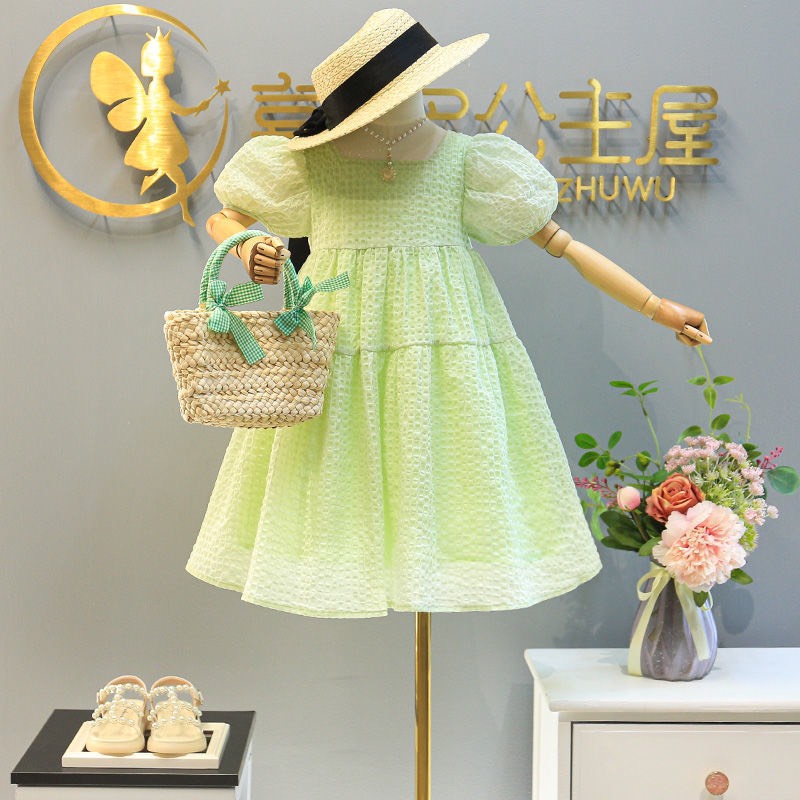 Váy bé gái xanh cốm 2 tầng nơ lưng xhn1016