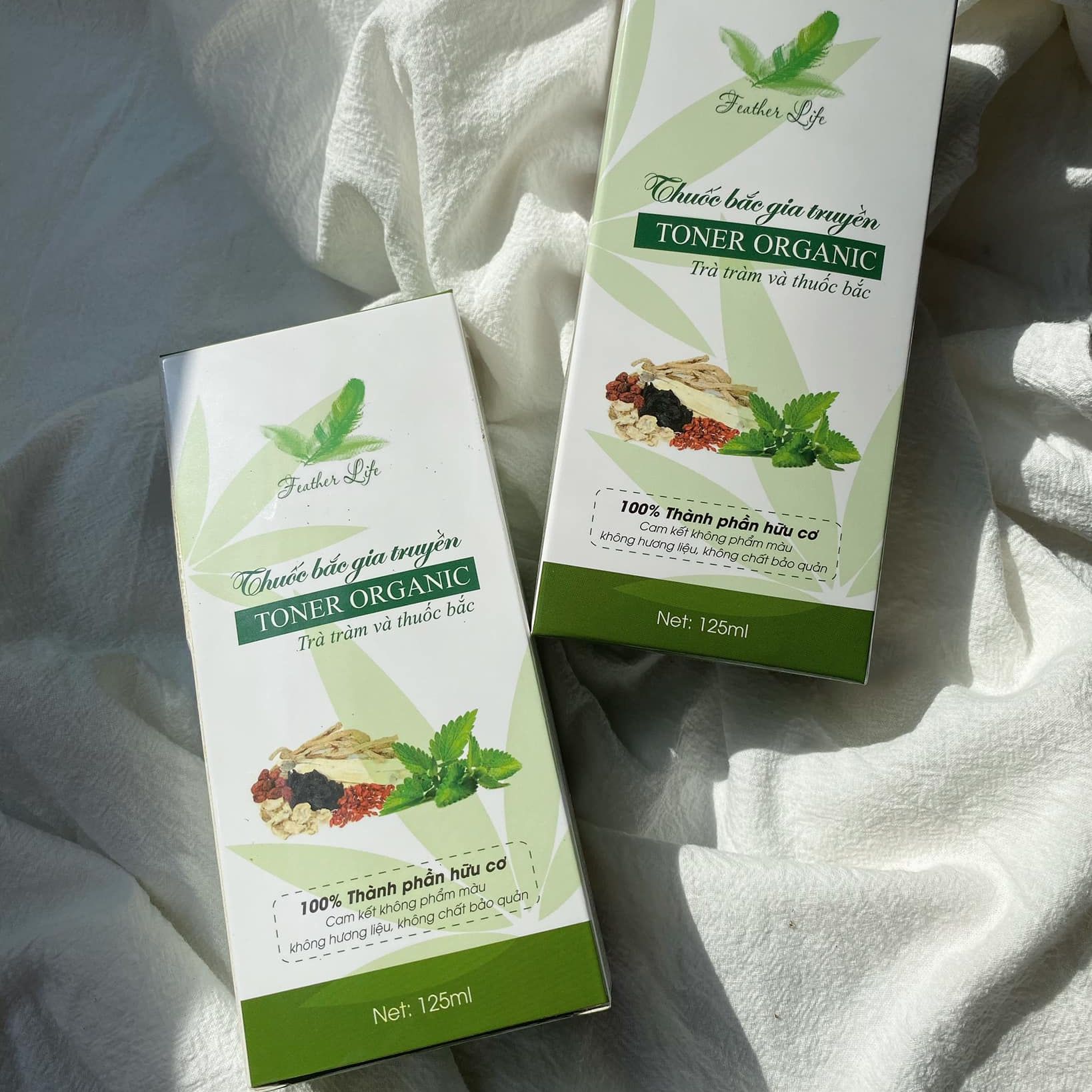 Bộ sản phẩm 2 chai thuoc bac tái tạo da Feather Life sạch mụn, thâm mụn và làm trắng da 2024 tặng kèm lọ giảm đỏ