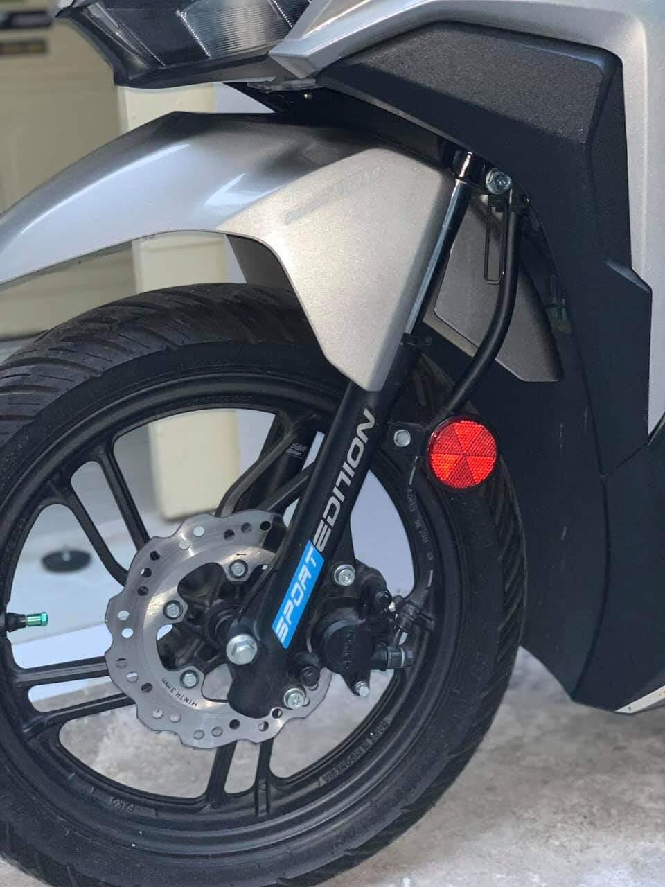 Mắt mèo phản quang xe máy