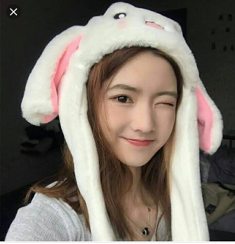 Nón lông tai thỏ giật, mũ lông tai thỏ giật giật 2 tai, bóp 2 tay thỏ 2 chiếc tai sẽ vẫy đáng yêu đẹp và ấm