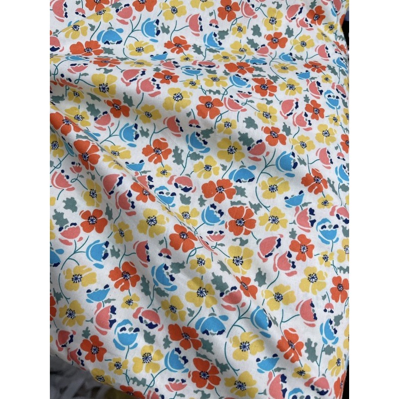 Vải thô cotton hoa cam vàng