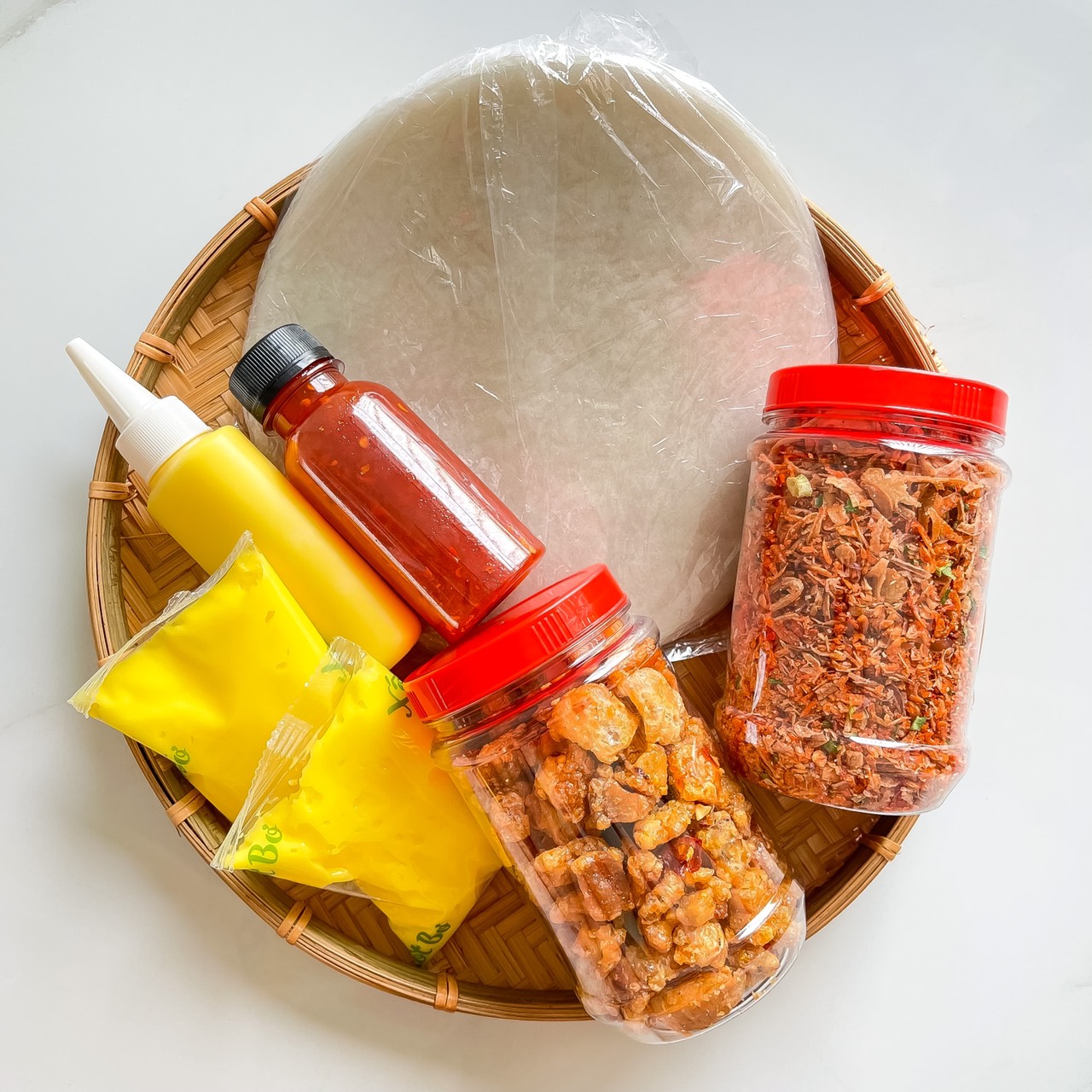 Combo g13 250g bánh tráng phơi sương+ 200g muối ruốc hành phi + 300g bơ+ 1 chai nước sốt tắc+ 150g tóp mỡ