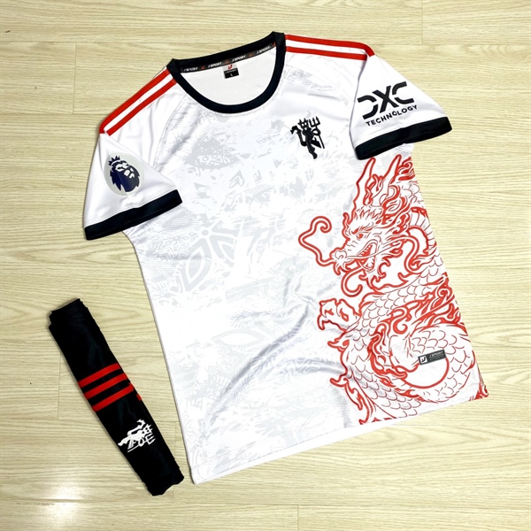 Bộ quần áo bóng đá MU trắng (bản tết) phối rồng JP-2024