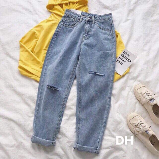 Quần bò rách lệch