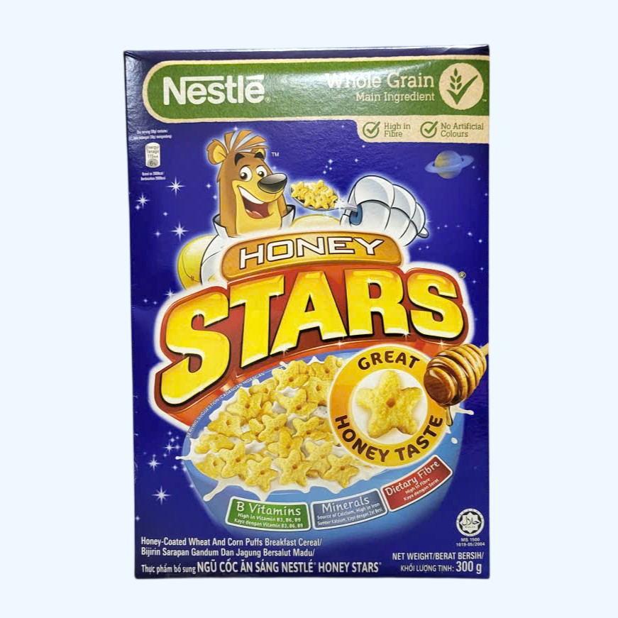 NESTLE -- Hộp STARS 300g -- NGŨ CỐC ĂN SÁNG MẬT ONG Whole Grain Honey Stars(HALAL)