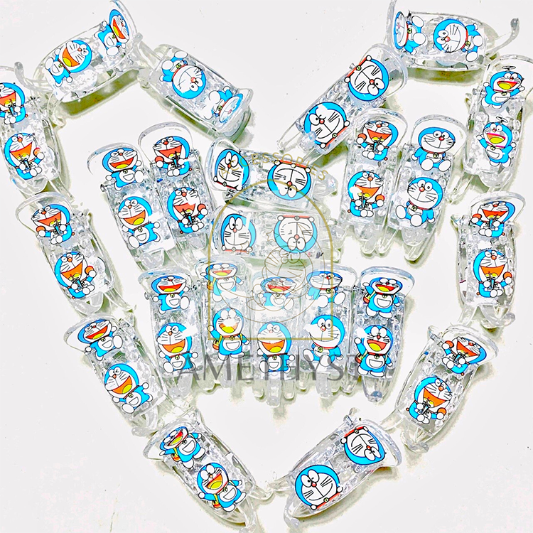 Kẹp tóc càng cua Doraemon nhiều màu nhựa trong suốt (Ngẫu Nhiên)