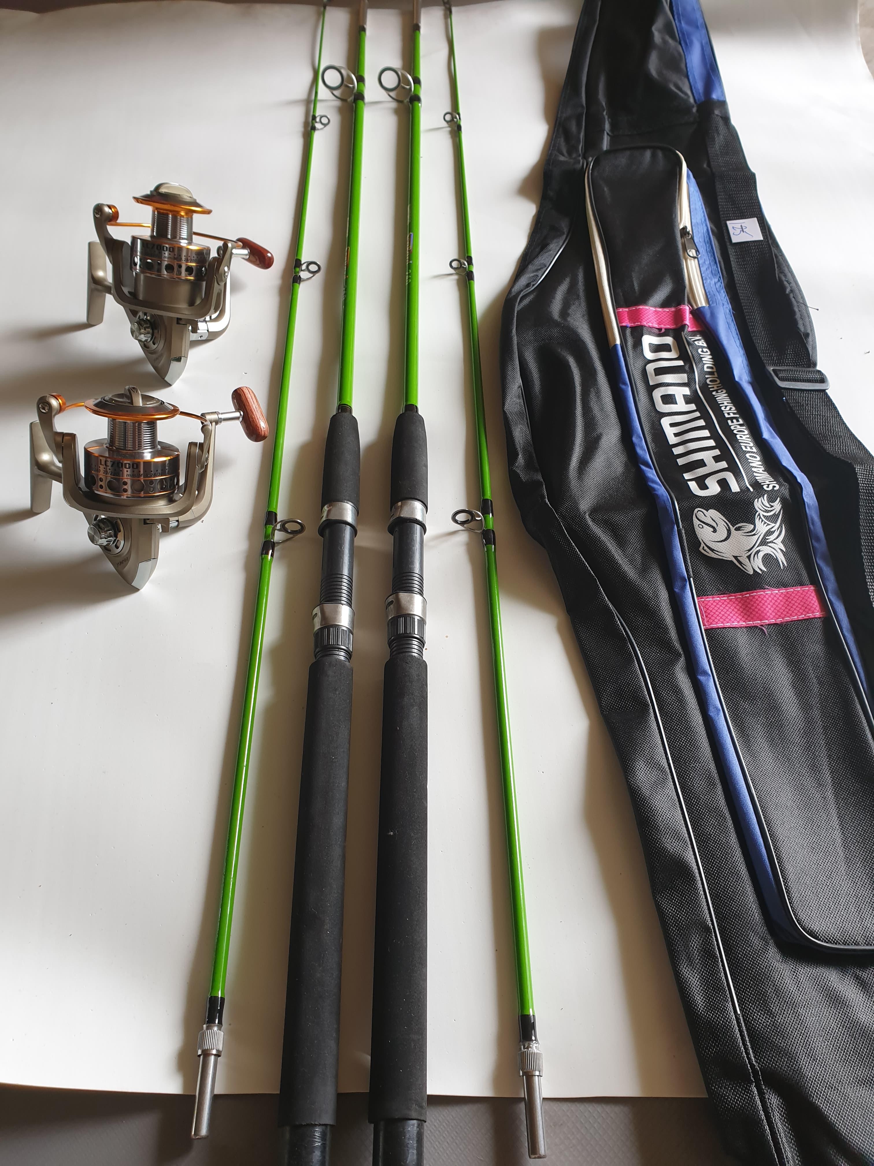 bộ combo 2 cần câu 2 khúc shimano 2m4 đặc ruột 2 máy yumoshi lc7000 kèm túi đựng cần 1m25