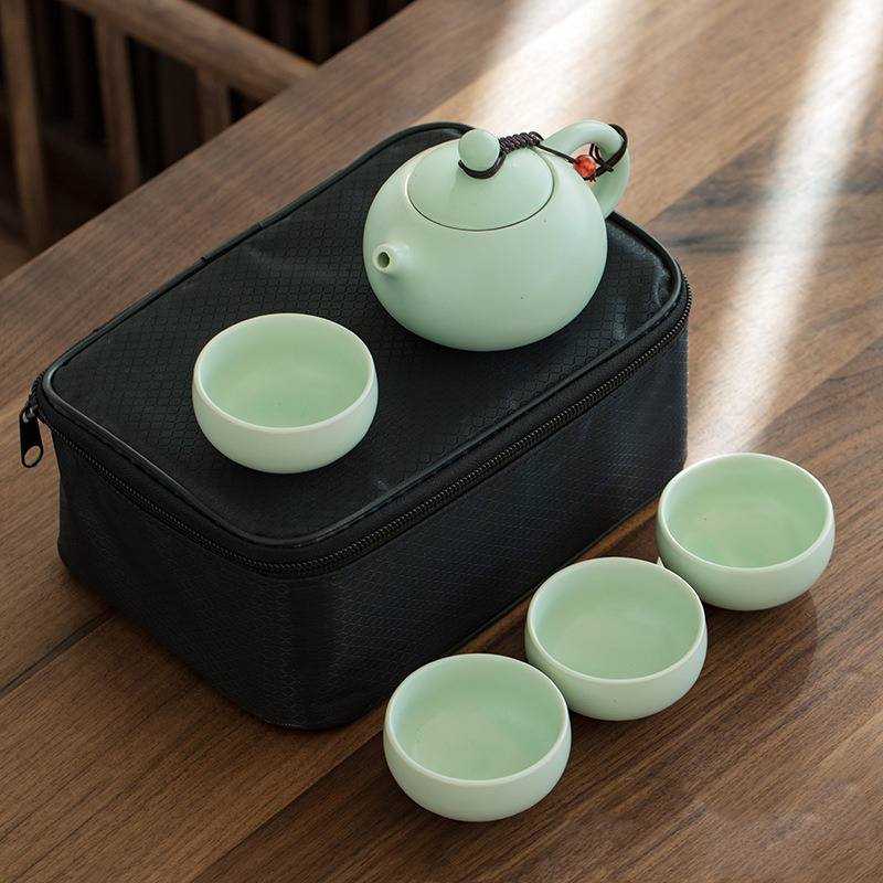 [HCM]Bộ Chén Trà Du Lịch 4 Chén - Túi Chống Sóc - Chén Sứ Xuyên Sáng