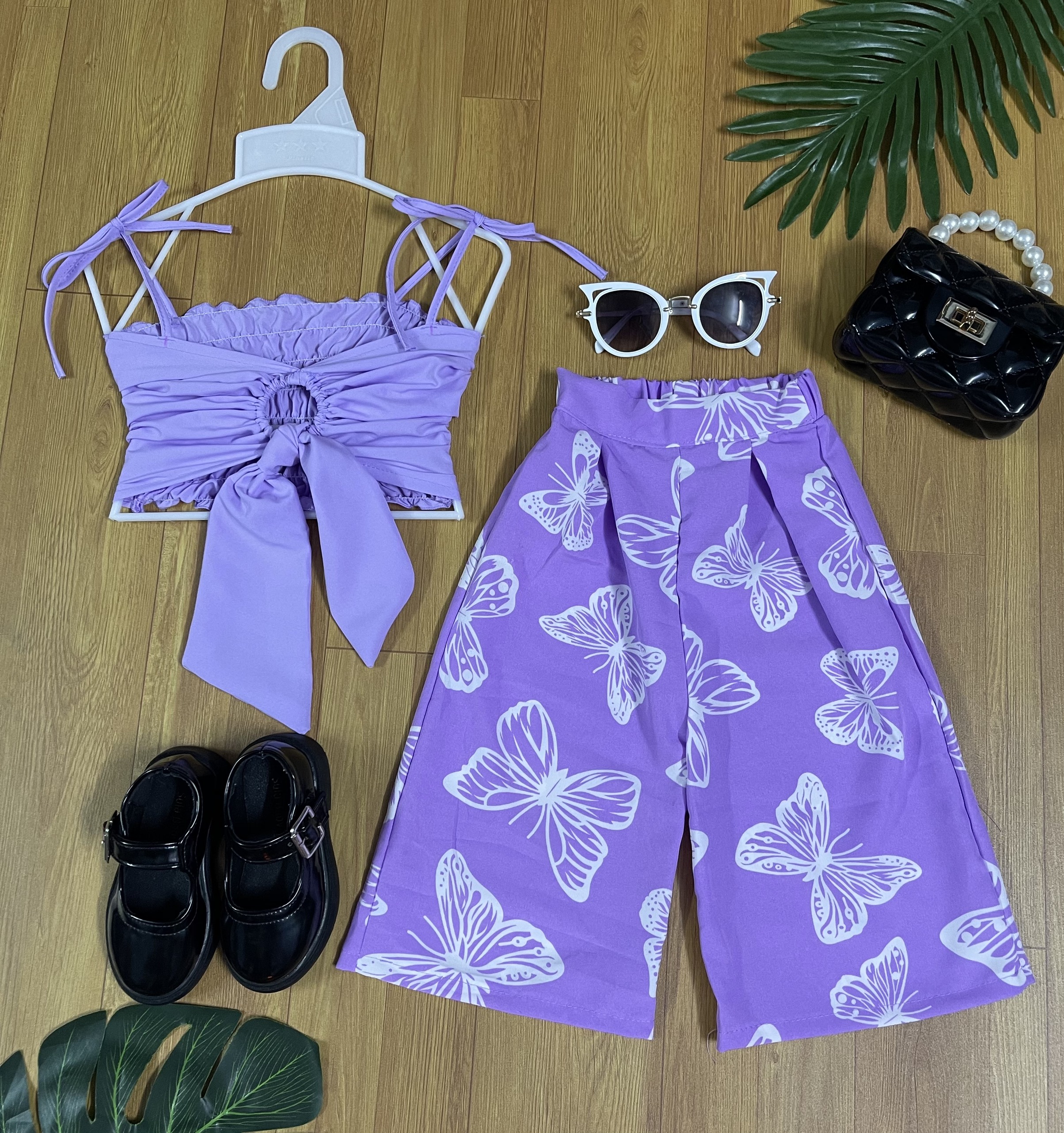 Set bộ bé gái áo cột dây khuyên tròn phối quần bướm ống rộng chất lụa mềm mại