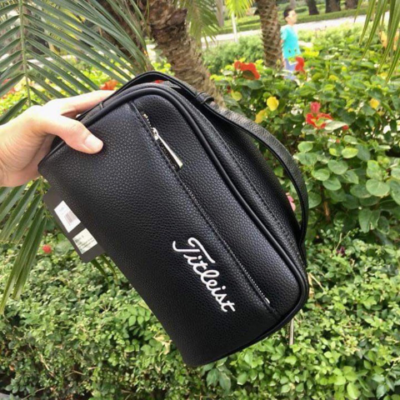 Túi cần tay golf - Túi golf cầm tay Titleist 2023 mẫu da sần, 2 ngăn khoá tiện dụng