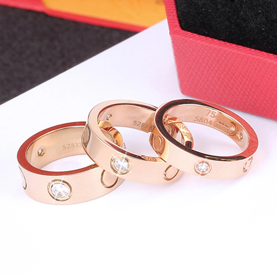 Nhẫn đôi nam nữ mẫu cartier love trang sức titan ko đen