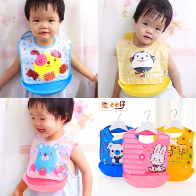 Yếm ăn dặm silicon chống thấm có máng tháo rời cho bé