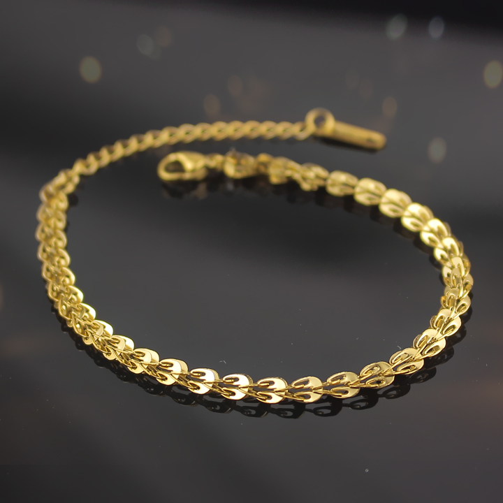 Lắc tay titan đuôi phụng màu vàng cbs116