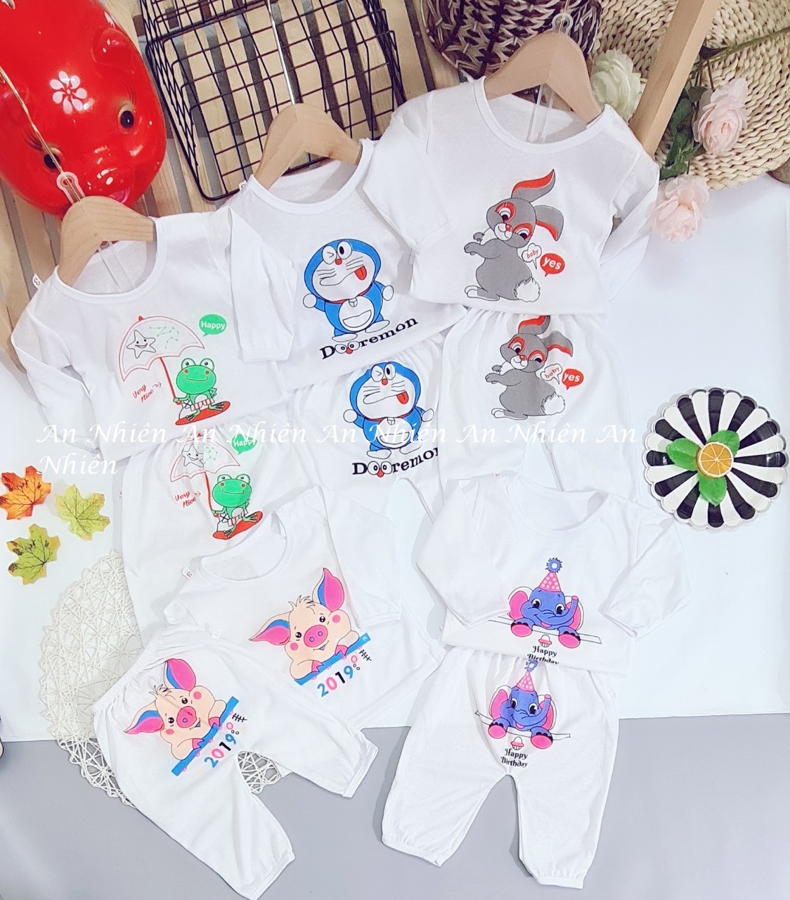 Quần áo trẻ em: Combo 5 bộ áo tay dài quần dài cotton 2 chiều DOREMON 3-14kg