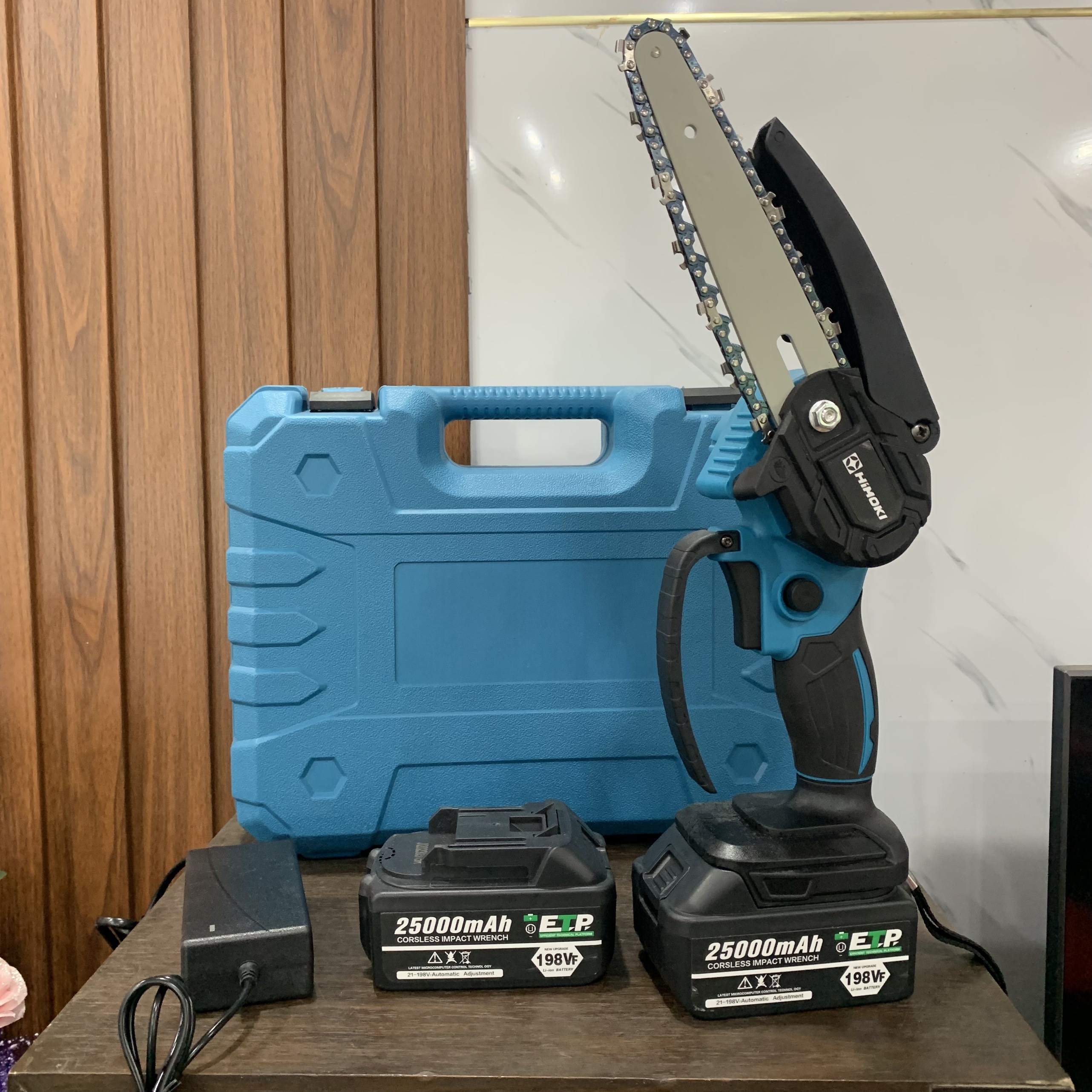 Máy cưa xích chạy pin cắt tỉa cành cây cảnh chung chân pin makita