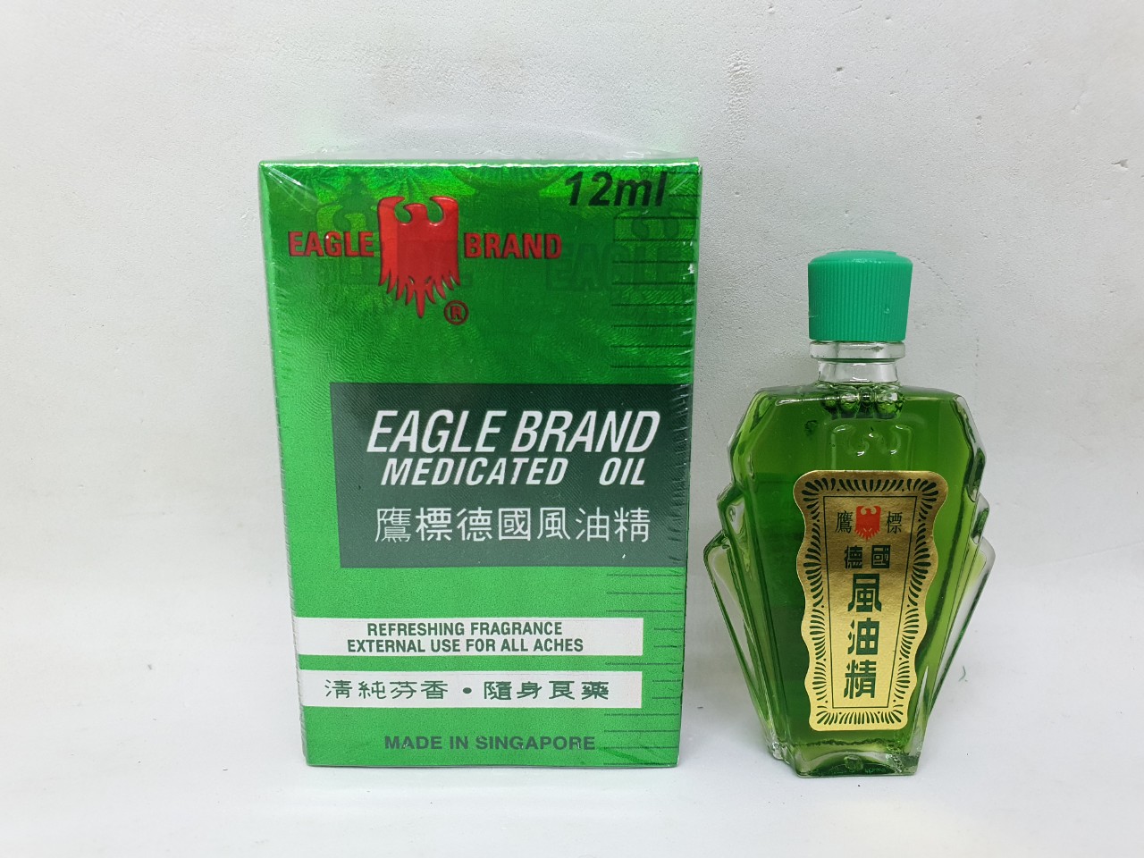 Dầu nước xanh con ó eagle brand medicated oil hàng nội địa chính hãng singapore 12ml