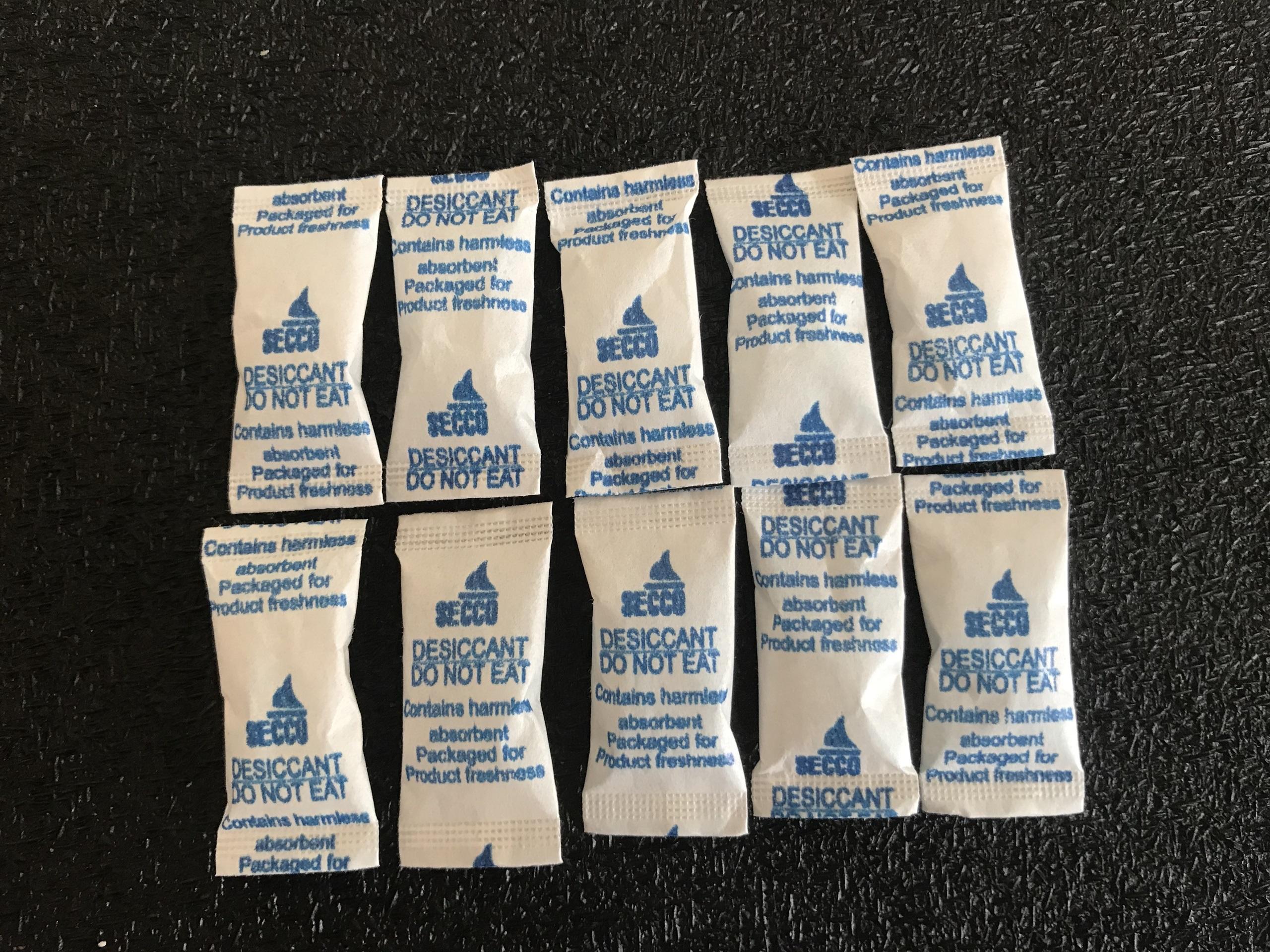 Gói hút ẩm / túi chống ẩm Silica gel bao bì giấy MG cao cấp, thương hiệu SECCO của Mỹ (Tùy chọn khối lượng)