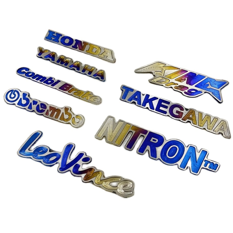 [HCM]Tem logo TITAN dán mặt nạ bợ đồng hồ biển số trang trí xe máy ( CÓ SẲN KEO 3MM )