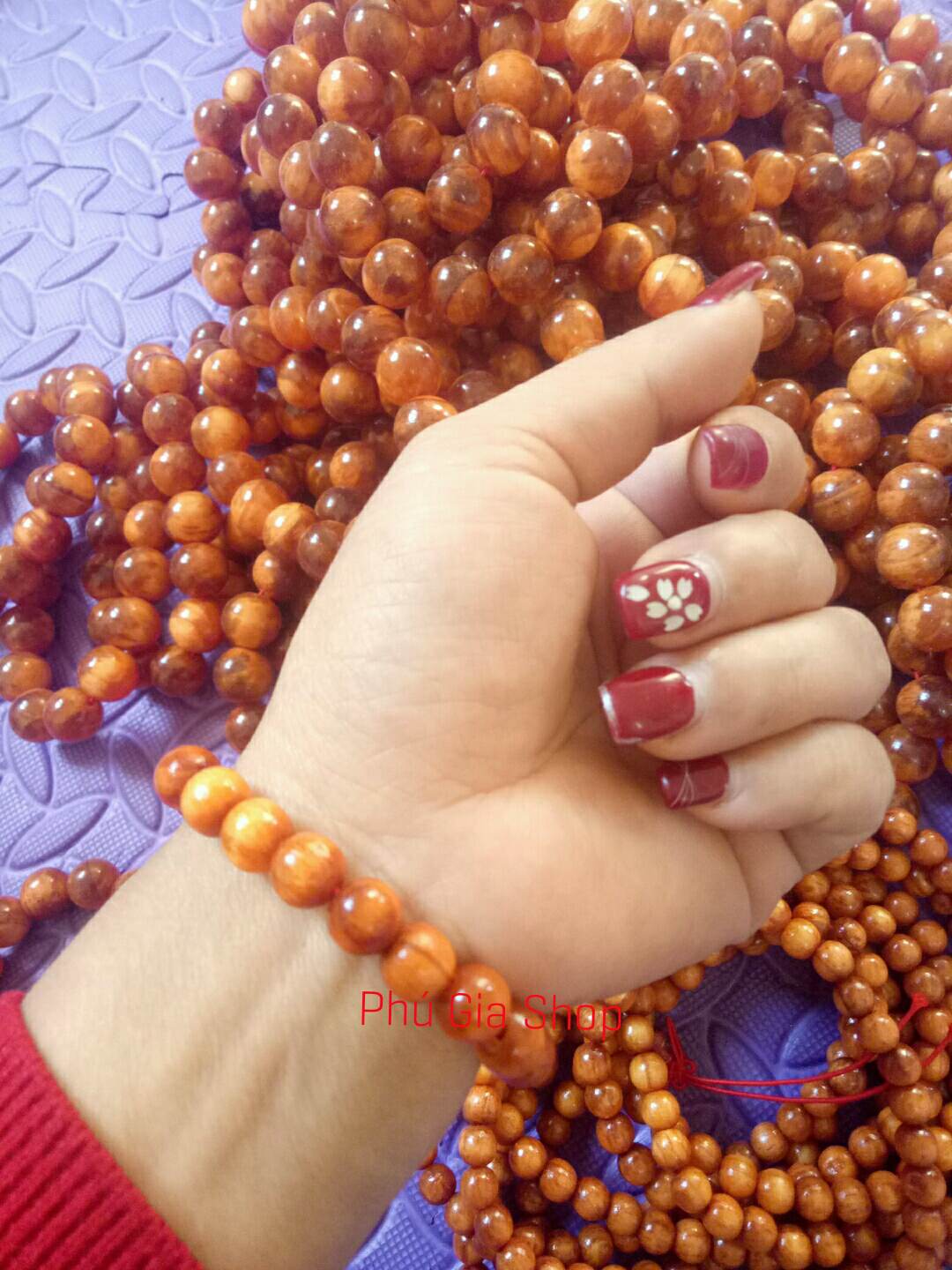 Vòng tay gỗ huyết long đỏ thấu quang size 8mm