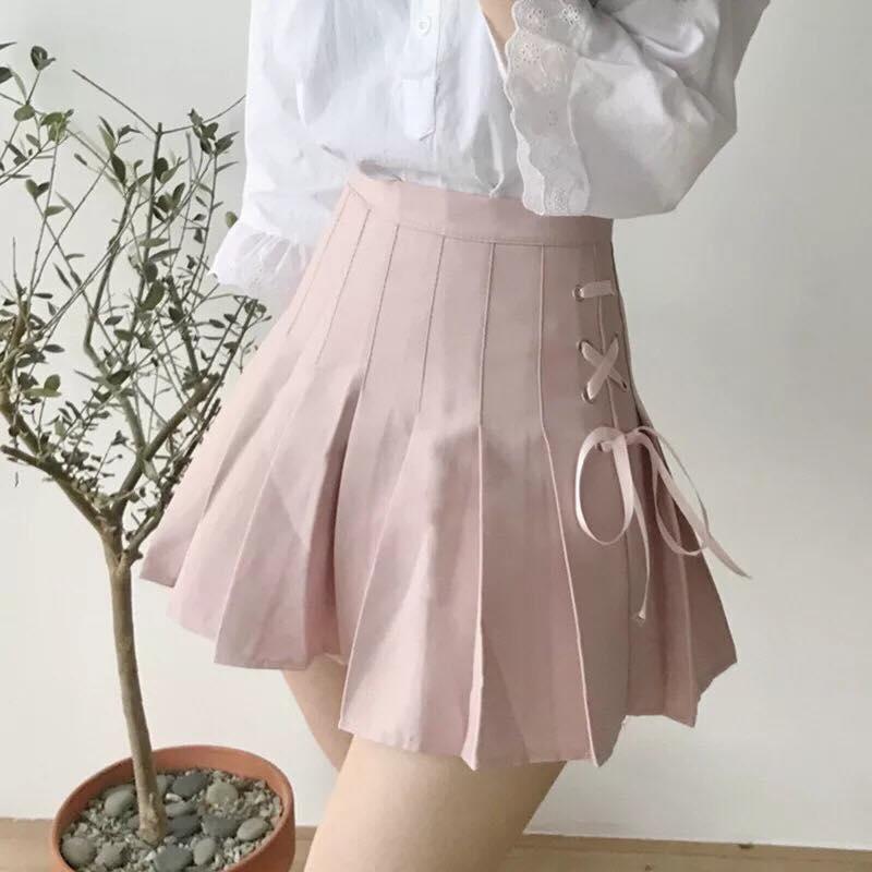 Chân váy xếp ly buộc nơ dễ thương